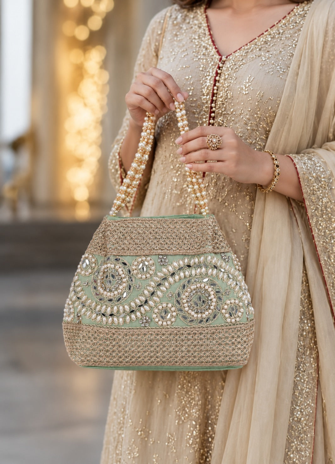 KarryQ Mint Green Stone Work Pearl Handle Potli Bag