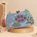 KarryQ Sky Blue Sequin Oval Embroidered Curved Frame Clutch