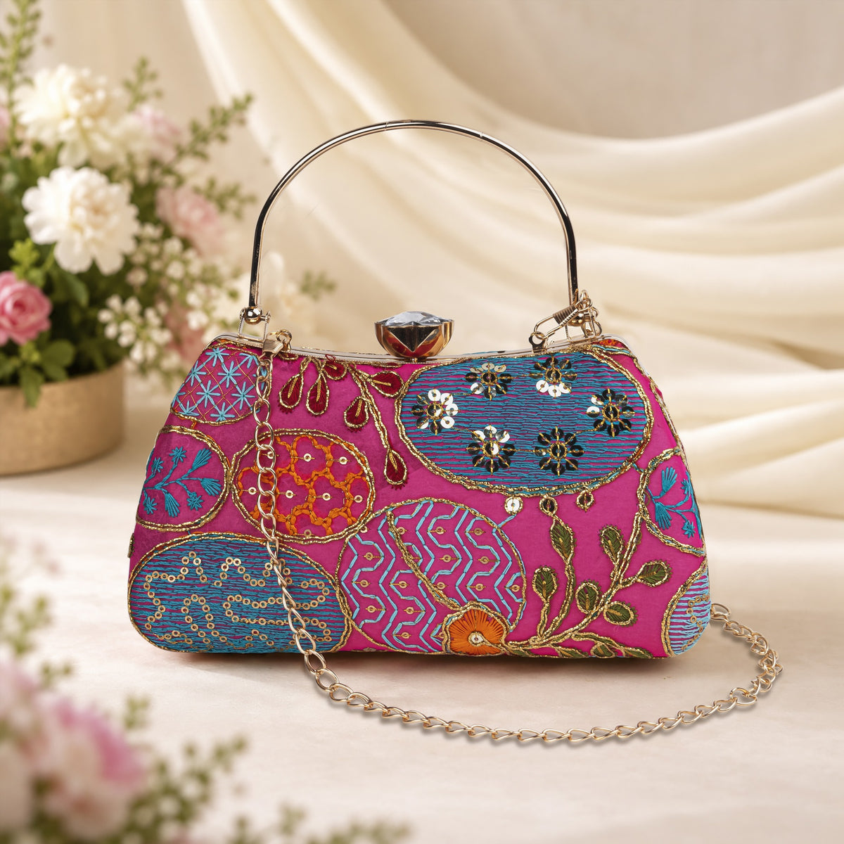 KarryQ Pink and Blue Oval Motif Embroidered Curved Frame Clutch