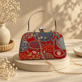 KarryQ Orange Red Sequin Oval Embroidered Curved Frame Clutch